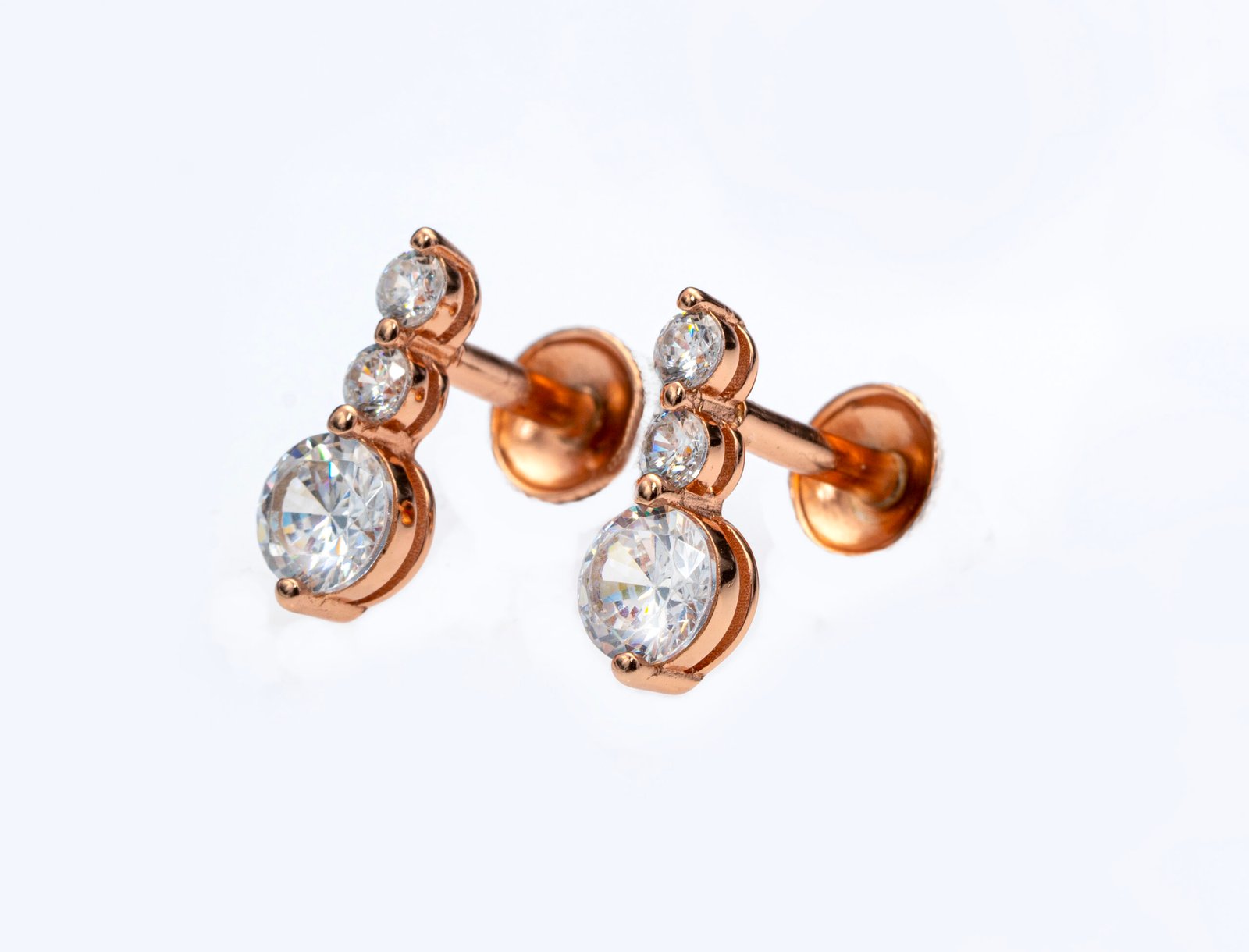 rose gold trio spark studs rose gold trio spark studs